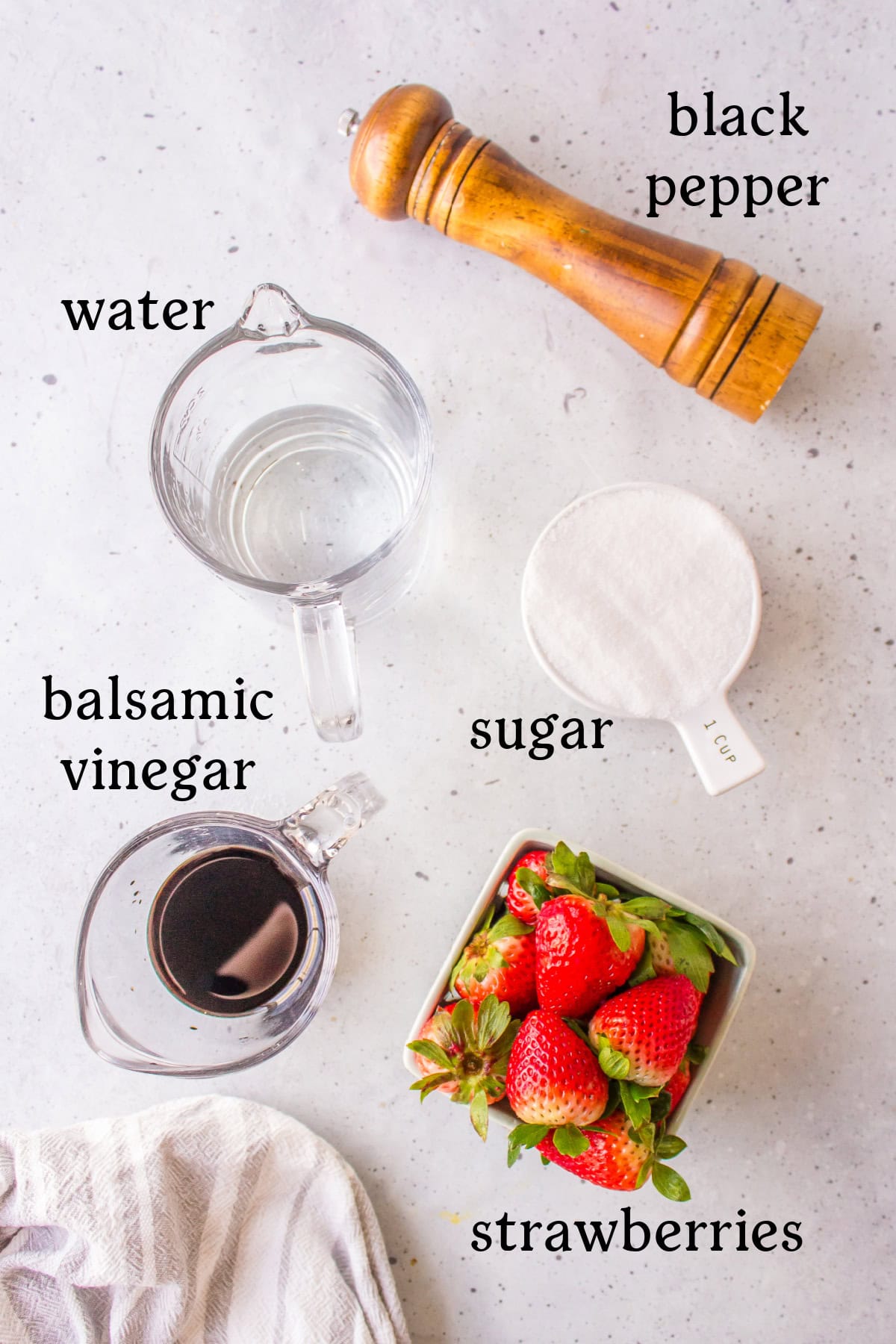 ingredients displayed for making balsamic strawberry sauce