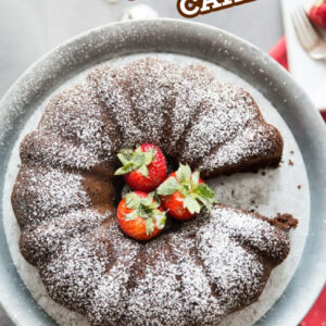 Overhead shot of a chocolate bundt cake with strawberries