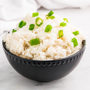 coconut rice in a brown bowl