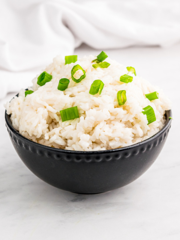 coconut rice in a brown bowl