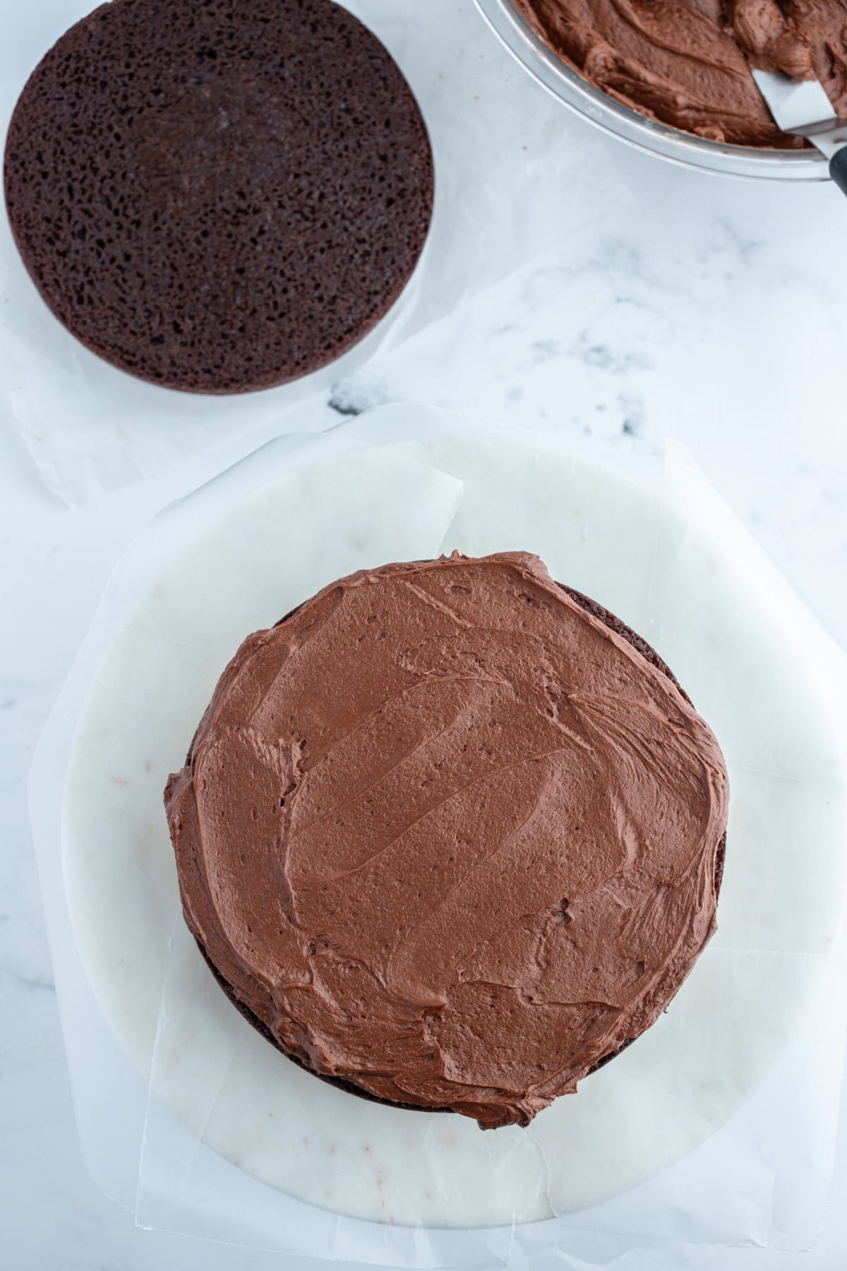 overhead shot of chocolate cake frosted