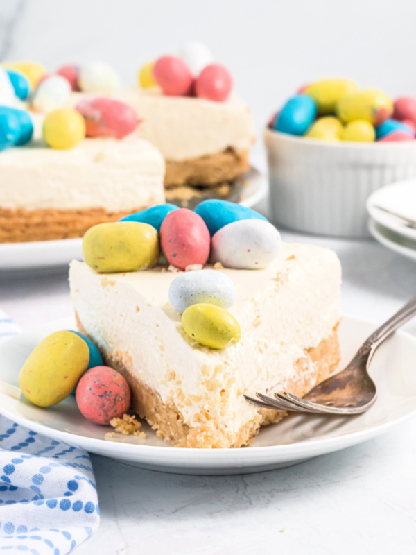 slice of malted mousse cake topped with easter eggs