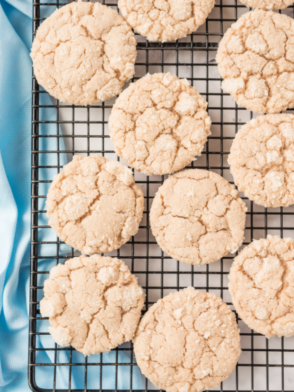 maple snickerdoodles on a baking rack