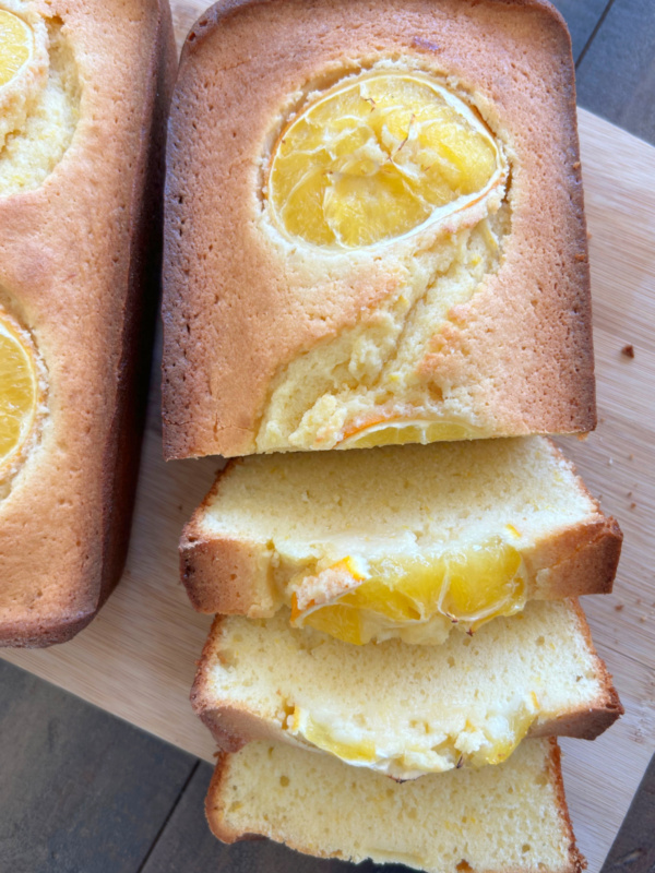 loaf of meyer lemon loaf cake sliced