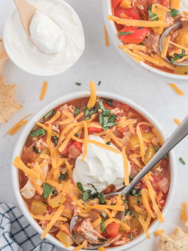 bowl of chicken chili with sour cream