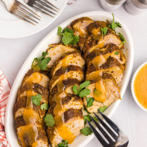 platter of pork tenderloin with apricot ginger sauce