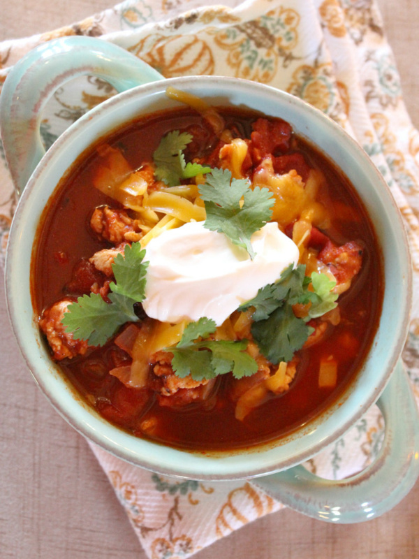 spicy turkey chili in a white bowl