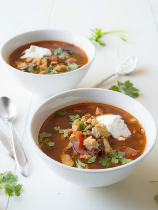 two bowls of chipotle chicken and tomato soup