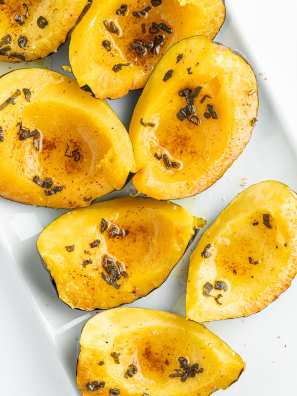 roasted winter squash wedges on a platter