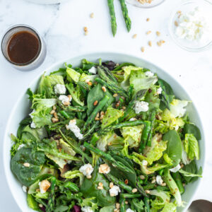 asparagus and goat cheese salad in bowl