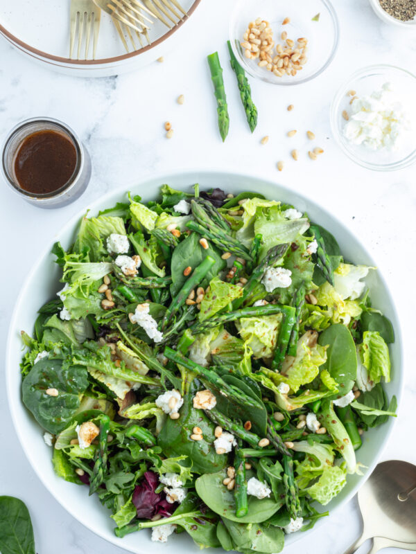 asparagus and goat cheese salad in bowl