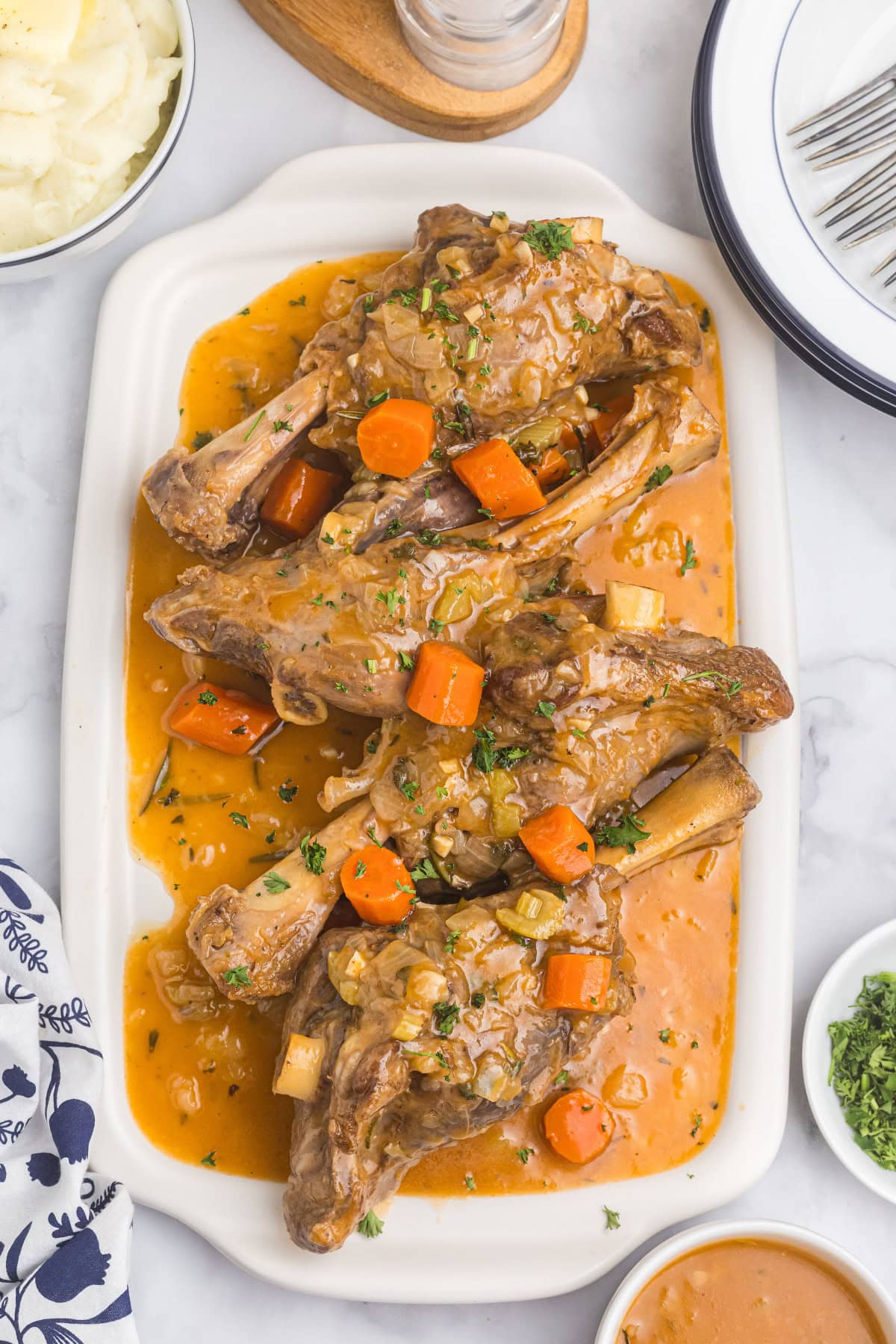 braised lamb shanks on platter