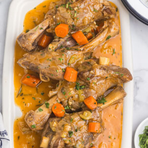 pinterest image for braised lamb shanks