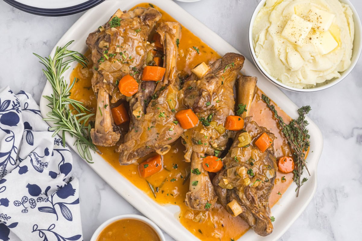 Braised Lamb Shanks in Sauce on platter