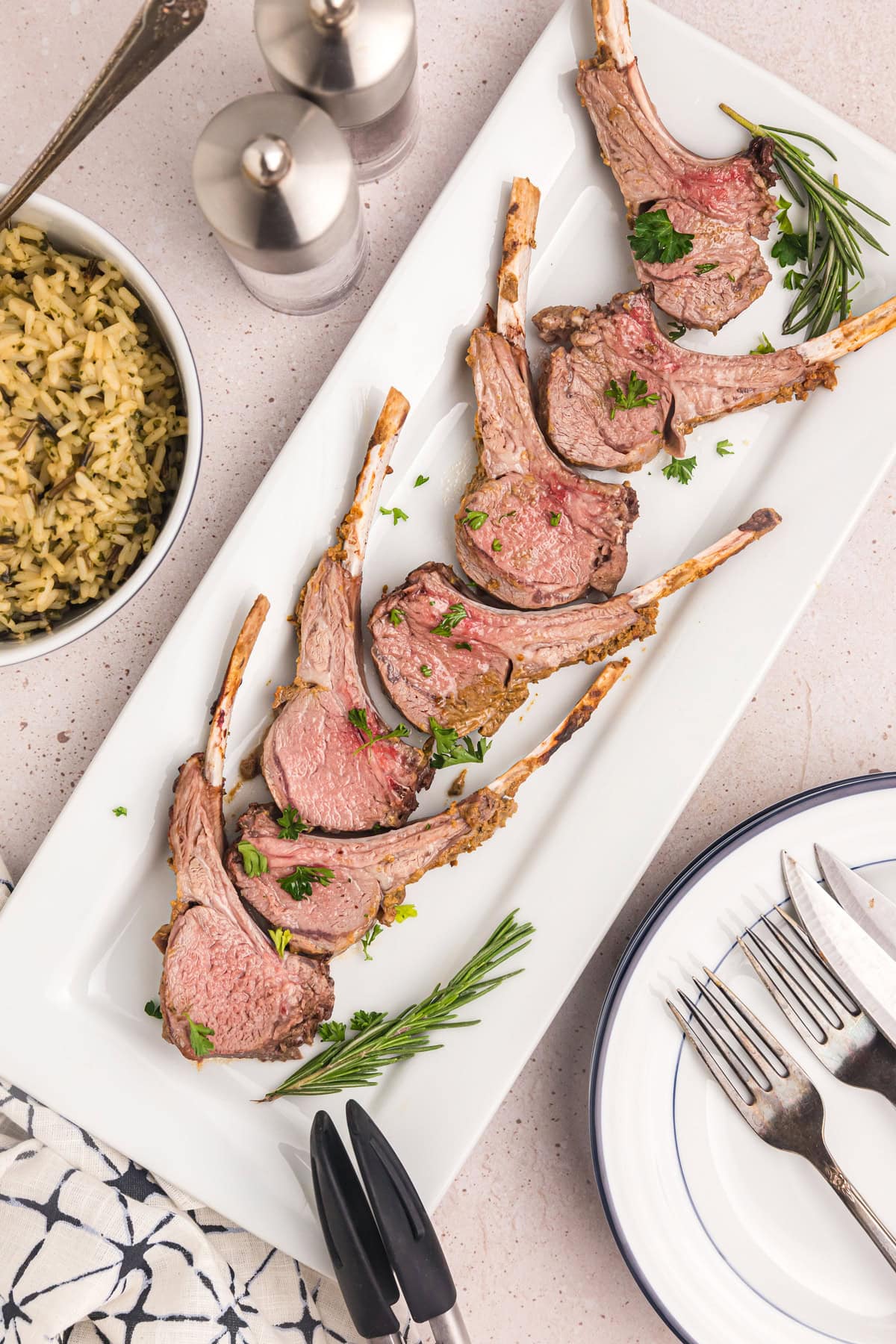 dijon balsamic rack of lamb cut into pieces and on platter