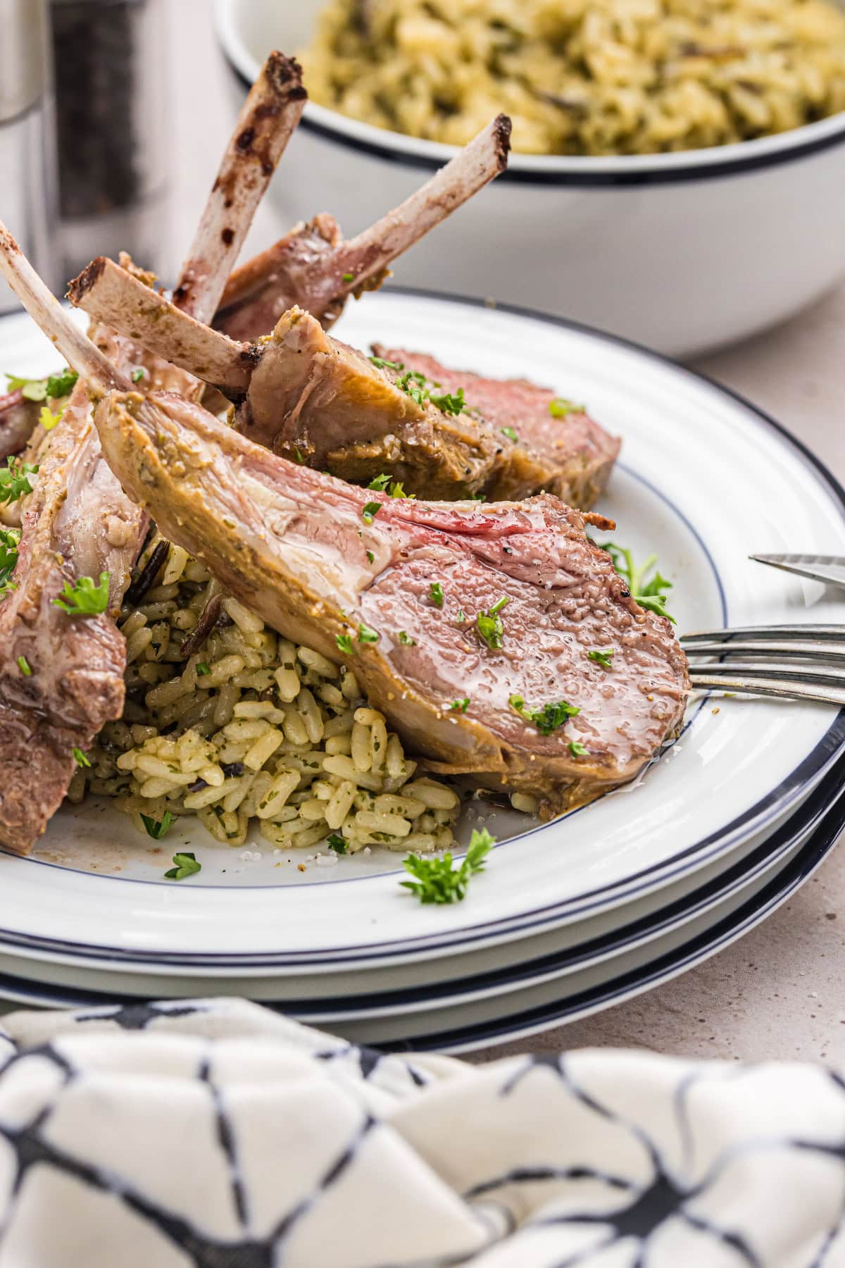 dijon balsamic rack of lamb pieces on plate