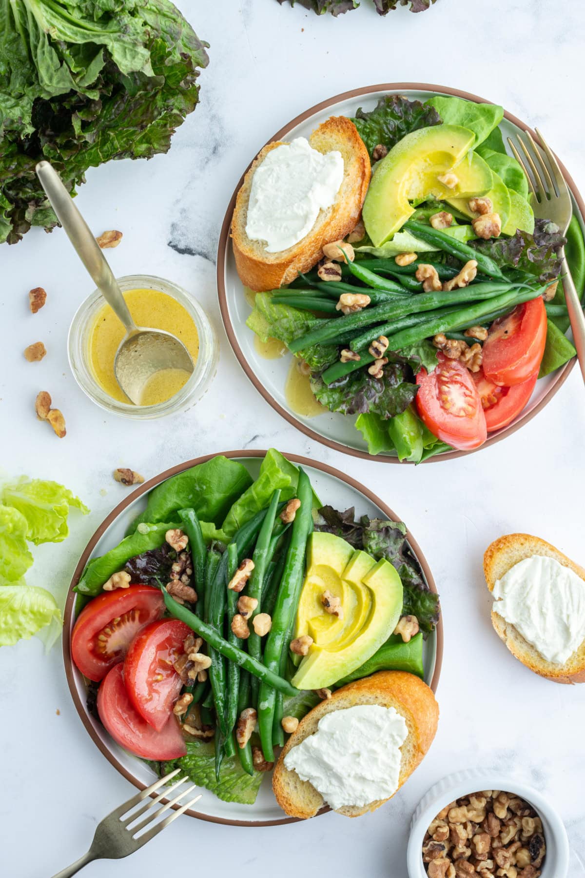 two servings of french goat cheese salad