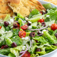 greek salad with seasoned flatbread