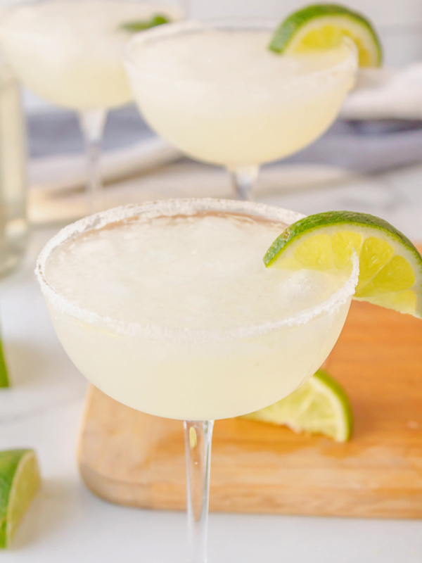 margarita in glass with lime wedge