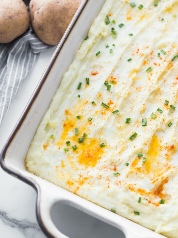 Creamy Oven Baked Mashed Potatoes in a Casserole Dish