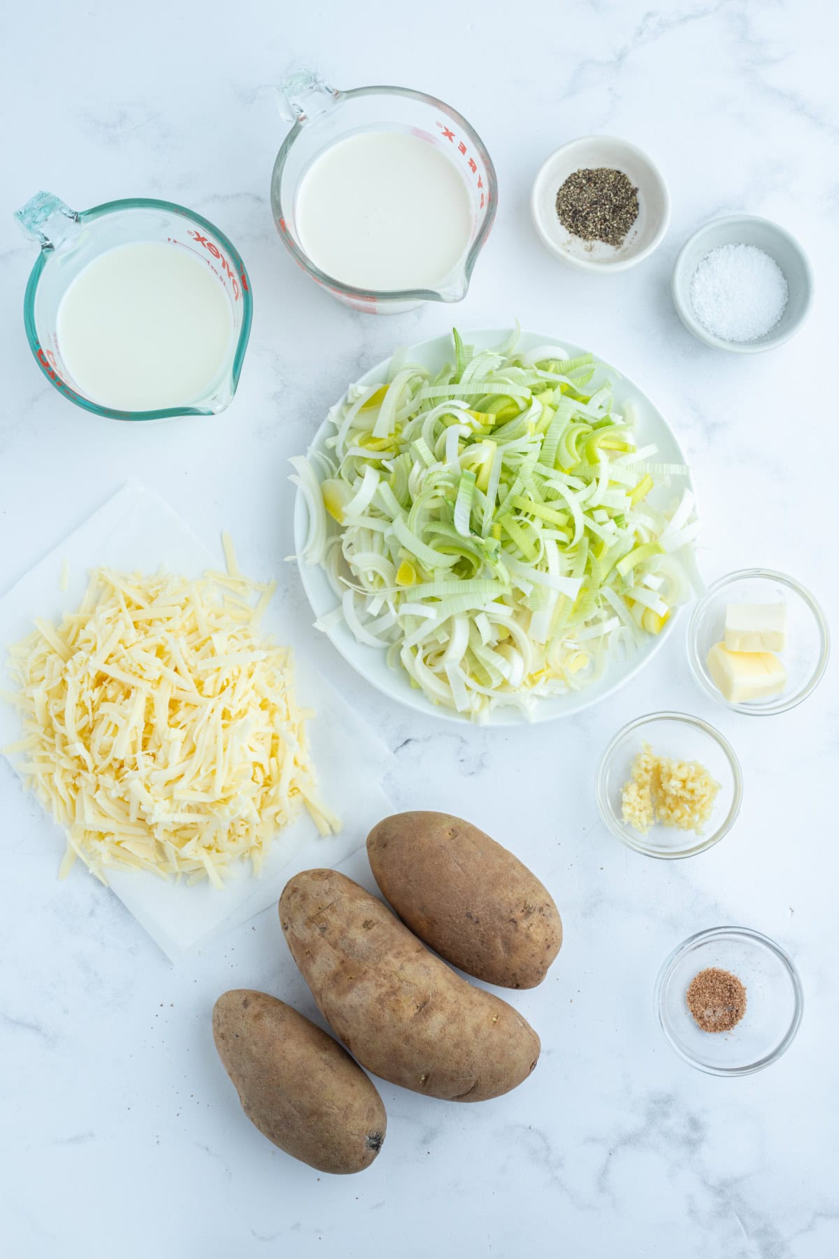 ingredients displayed for making potato leek gratin