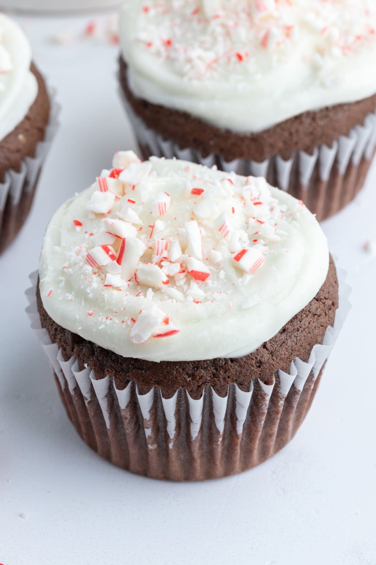 close up chocolate cupcake with peppermint icing