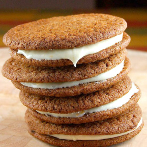 stack of 4 gingersnaps with orange cream filling