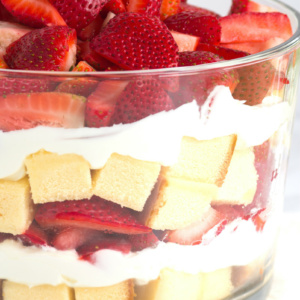 layered strawberry trifle in a glass trifle dish