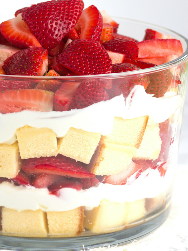 layered strawberry trifle in a glass trifle dish