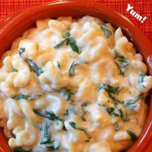 pinterest image for spinach macaroni and cheese