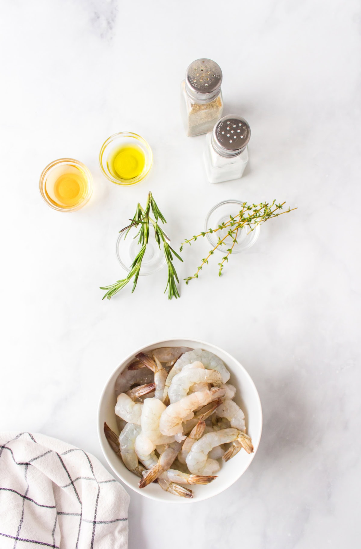 ingredients displayed for making roasted shrimp with rosemary and thyme