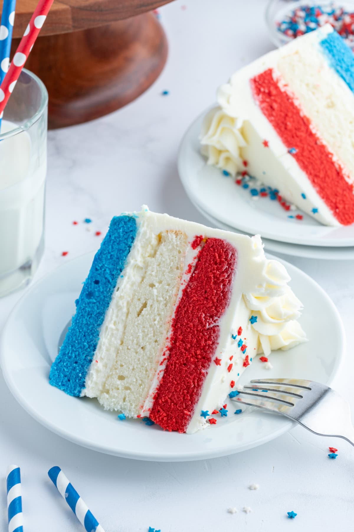 slice of red white and blue cake on plate
