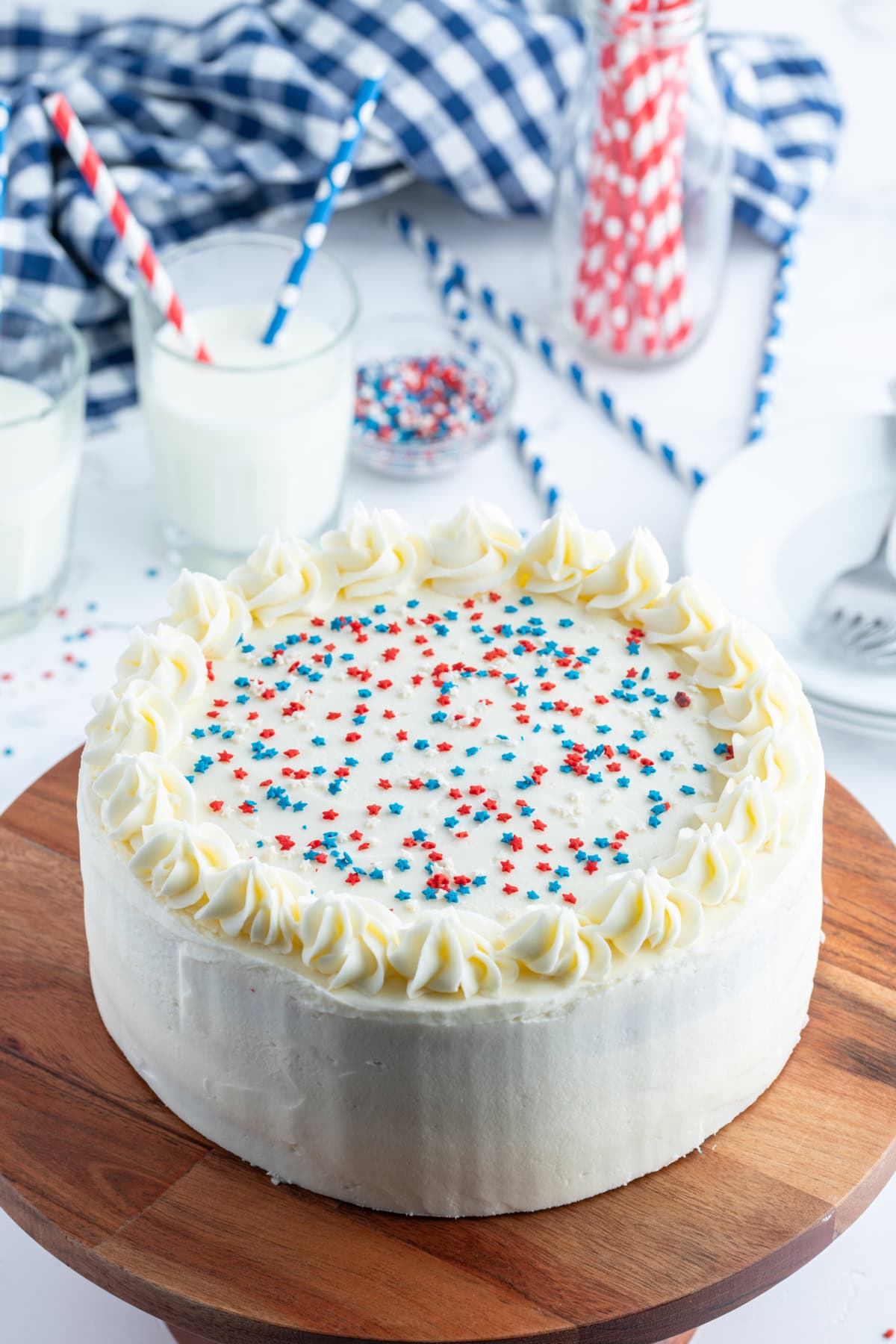 red white and blue cake on board