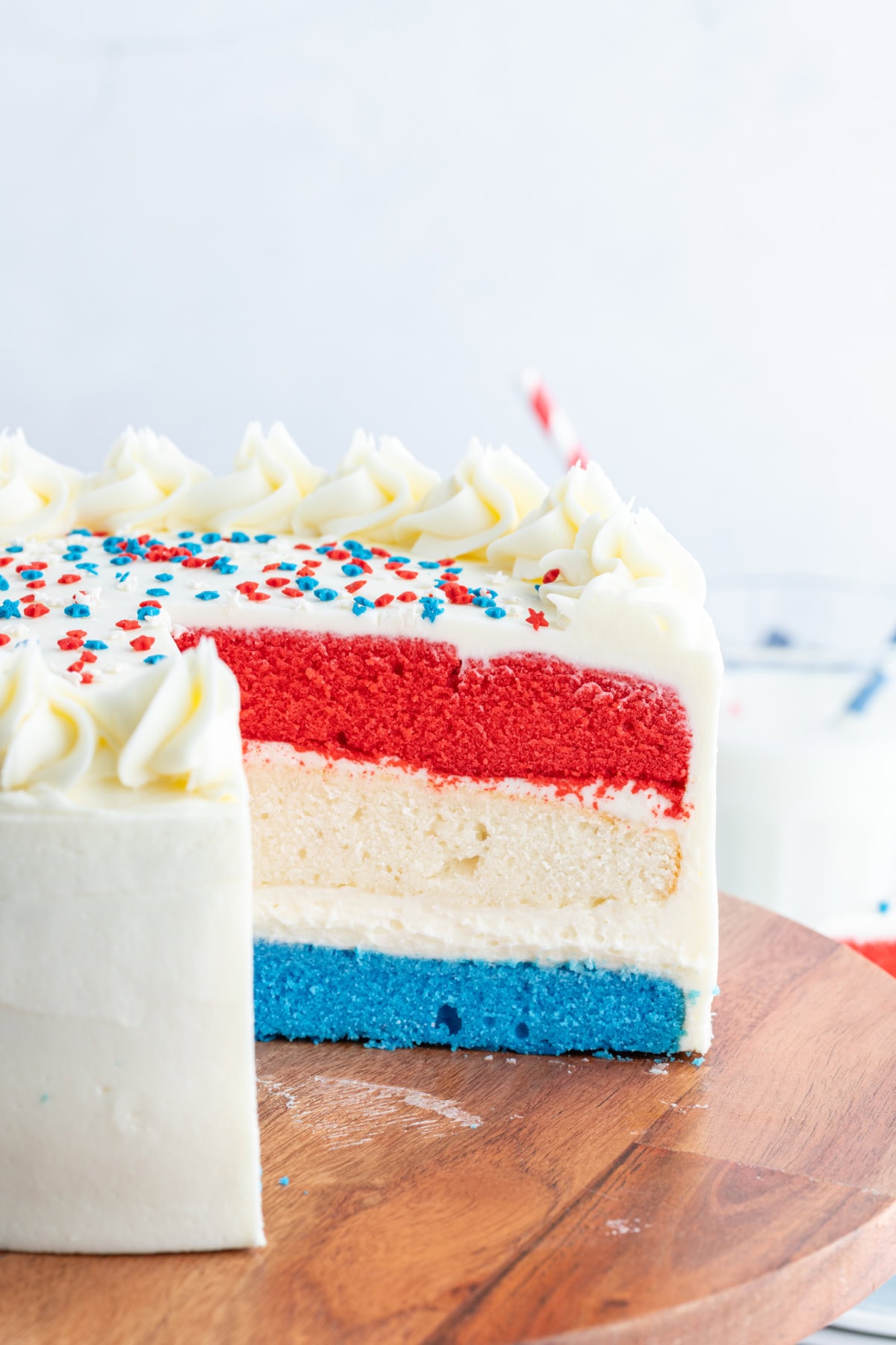 red white and blue cake sliced open to see inside