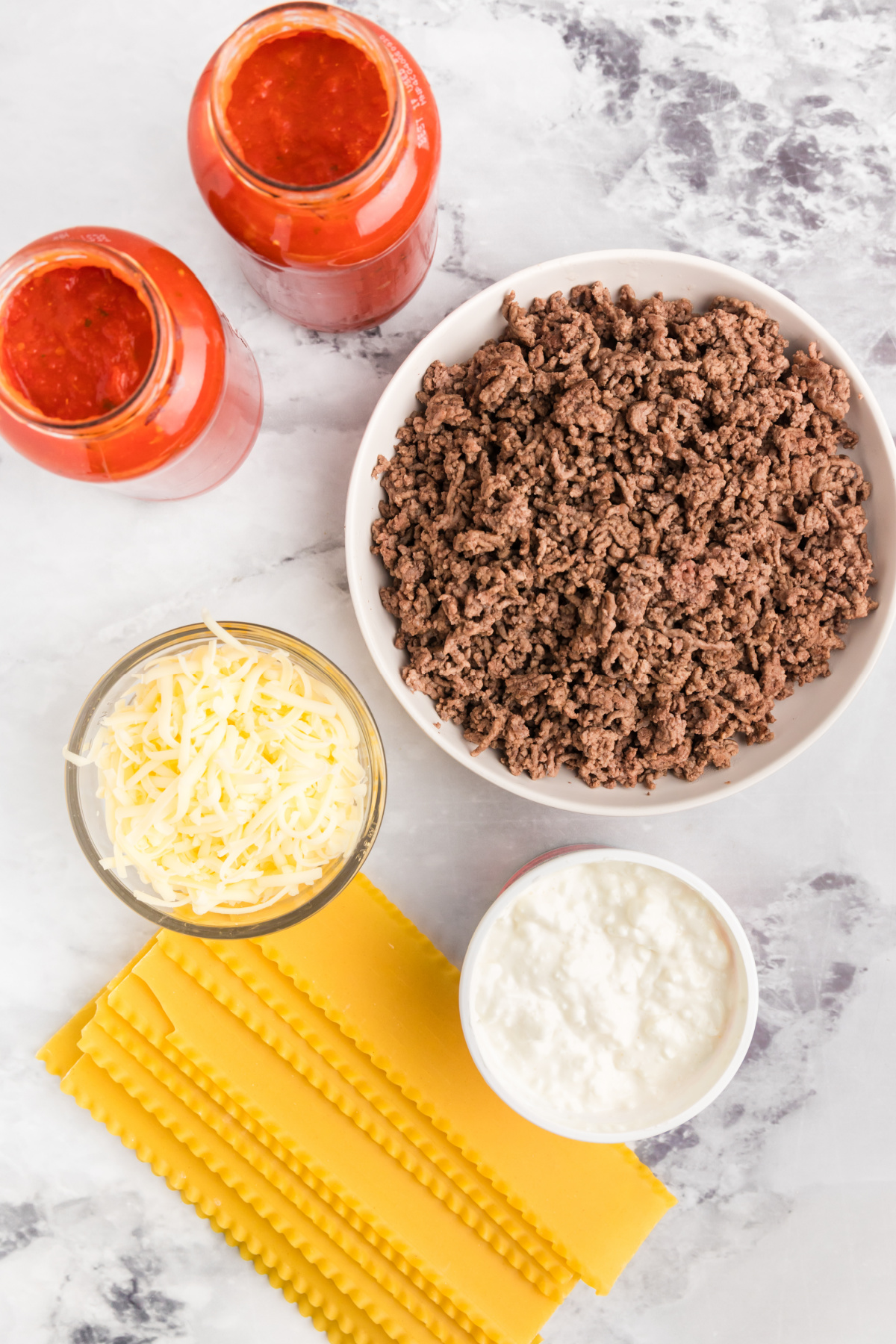 ingredients displayed for making slow cooker lasagna