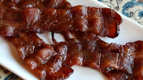 https://www.recipegirl.com/wp-content/uploads/2012/04/Candied-Bacon-1-480x270.jpg