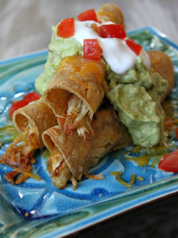 Easy Baked Chicken Taquitos on a blue plate