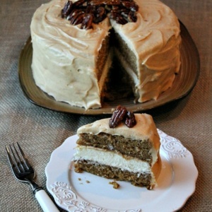 pumpkin cheesecake cake with slice in front of it