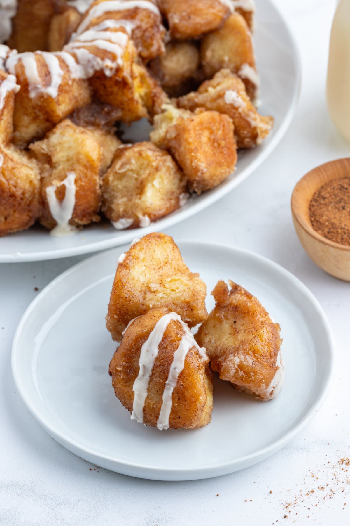 pieces of eggnog monkey bread on plate