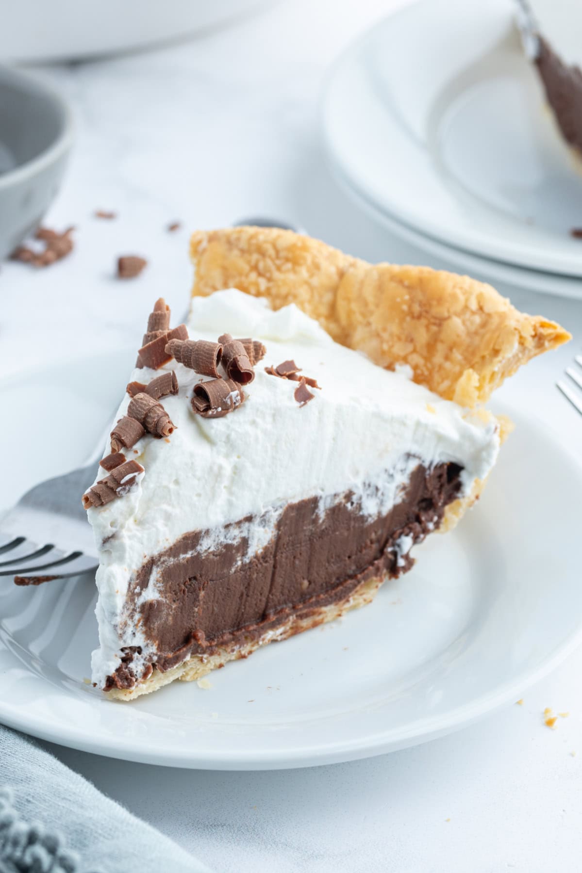 slice of chocolate cream pie on a plate