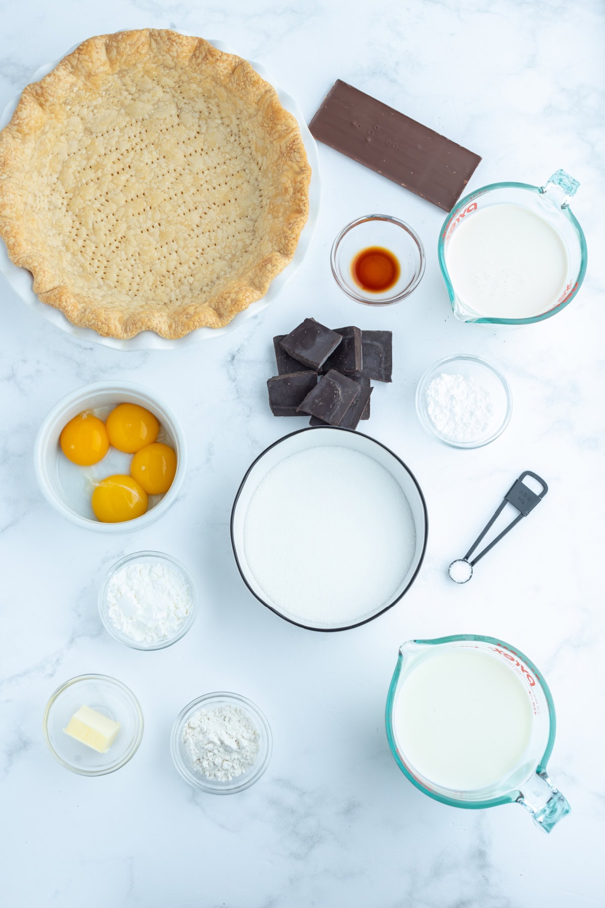 ingredients displayed for making chocolate cream pie