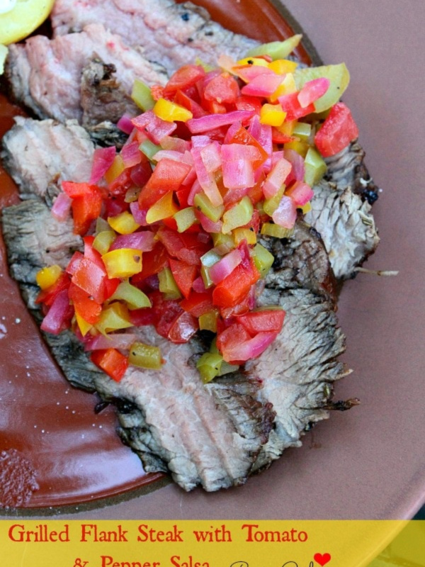 grilled flank steak topped with salsa