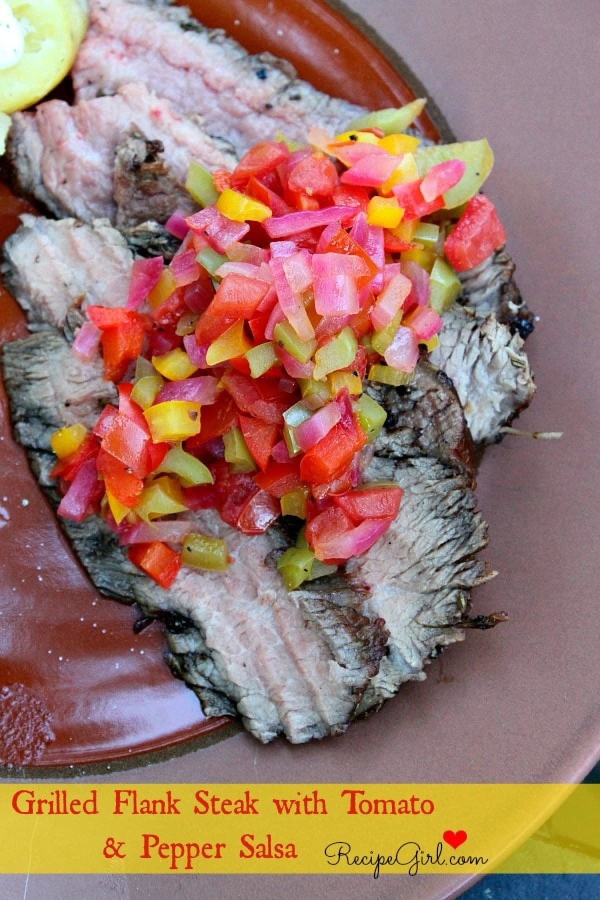 grilled flank steak topped with salsa