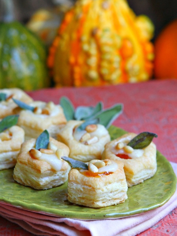 apricot brie bites appetizers on a green platter