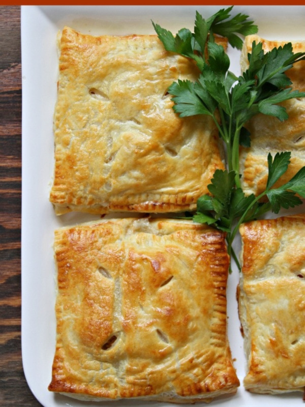 puff pastry pockets on a plate filled with turkey