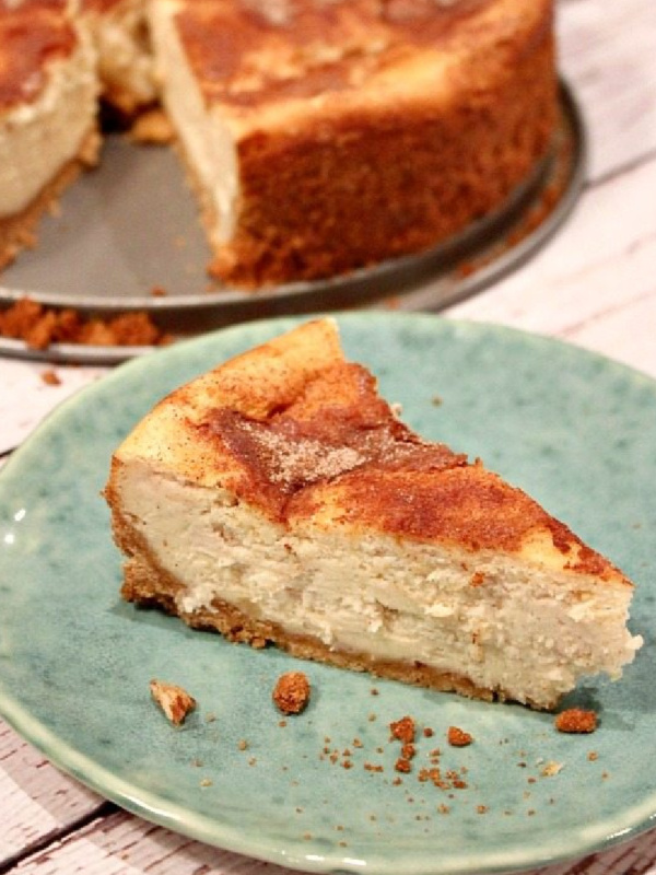 slice of snickerdoodle cheesecake on a green plate