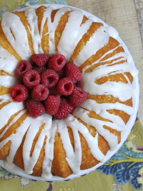 raspberry lemonade bundt cake with fresh raspberries