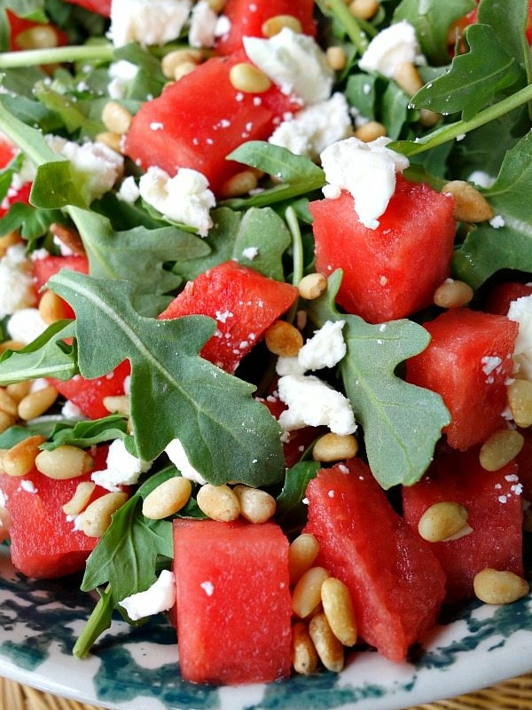 close up of watermelon, feta and arugula salad