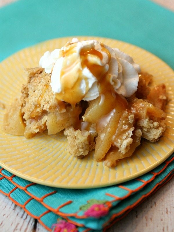 serving of irish apple crisp on yellow plate