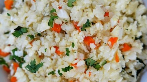 https://www.recipegirl.com/wp-content/uploads/2015/09/Cauliflower-Rice-Recipe-RecipeGirl.com_-480x270.jpg